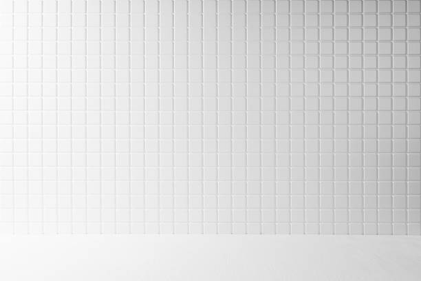 istock White abstract modern stage with tiny square ceramic tiles on wall and wood floor, grey gradient as empty interior like bathroom, kitchen, mockup for presentation cosmetic products, goods, design. 1484045527