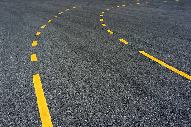 istock Bicycle lane road in the park 148404719