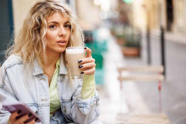 istock Enjoying coffee and good morning messages 1484051571
