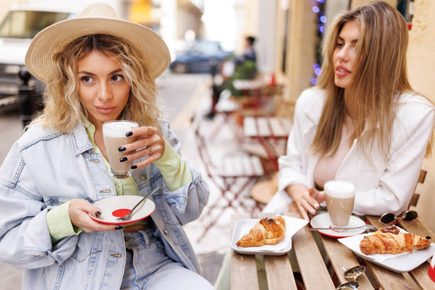 istock Enjoying coffee and croissants at favorite cafe 1484052591