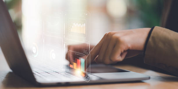 istock Businessman reading graph report and business statistics charts ,Analysis and improvement of corporate strategy ,Statistics and Data Concepts ,update annual budget accounts , business growth graph 1484052673