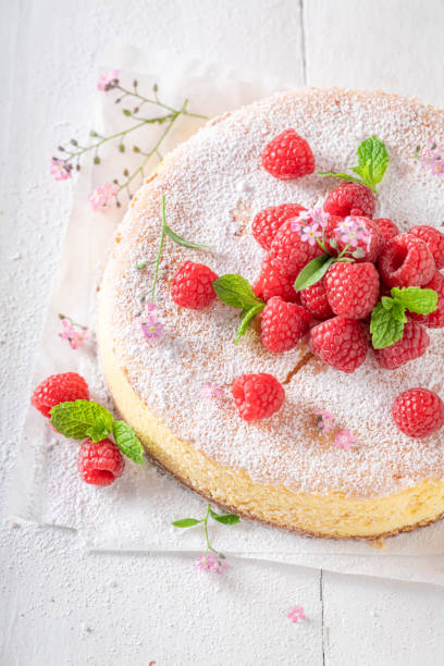 istock Homemade cheesecake decorated with raspberries and mint. 1484053594
