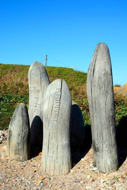 istock Wooden boundary sculptures, West Bay. 1484053695