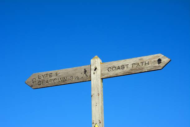 istock Wooden coast path sign, West Bay. 1484053698