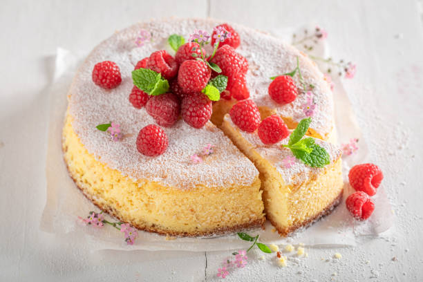 istock Sweet cheesecake decorated with raspberries and mint. 1484054255