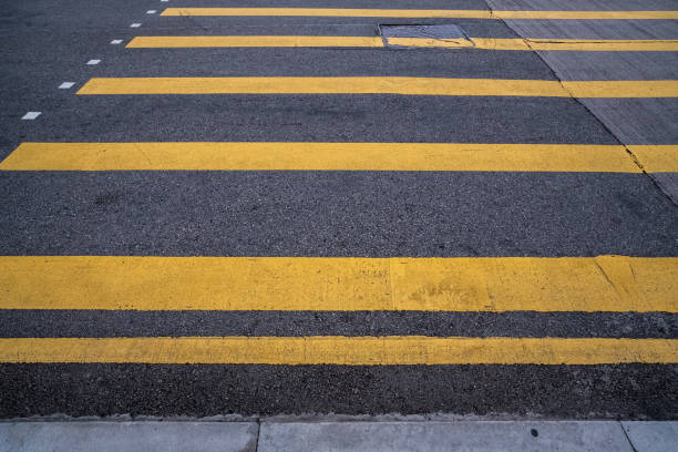 istock Yellow lines on asphalt road 1484054256