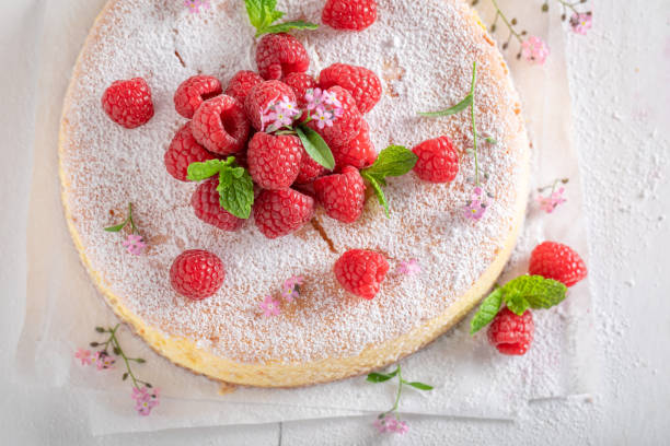 istock Tasty cheesecake with powdered sugar and berries. 1484055013