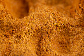 ground turmeric is orange in color for use in cooking