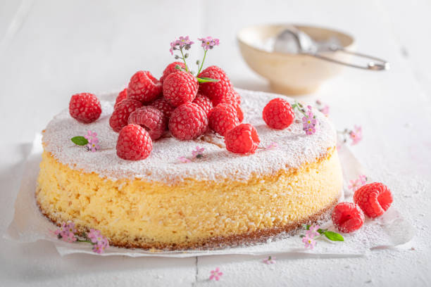 istock Tasty cheesecake decorated with raspberries and mint. 1484055573