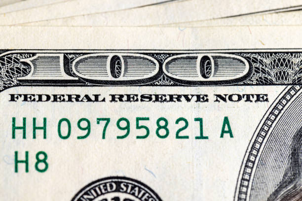 istock several American hundred dollar bills close-up 1484055970