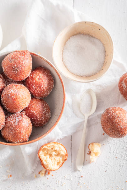 istock Hot mini doughnuts baked at home bakery. 1484056050