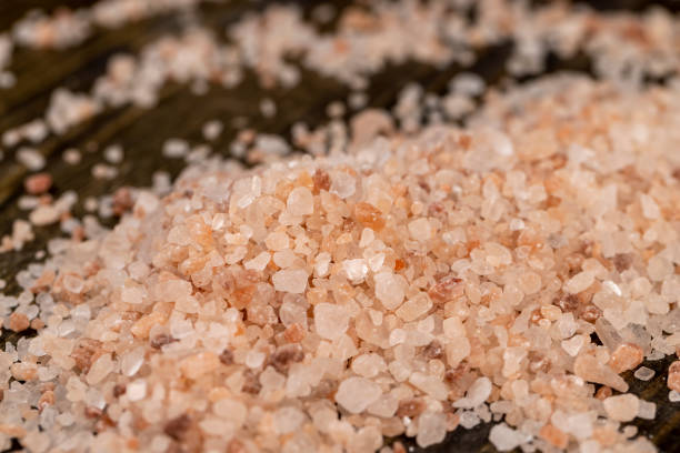 istock Pink natural salt on the table, close up 1484056173