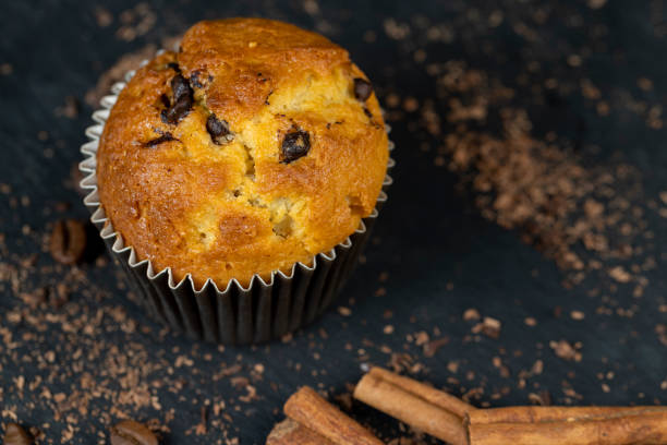 istock Sweet fresh cupcake with chocolate pieces 1484058748