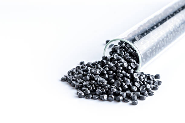 istock Small pieces of crushed plastic. Crushed bottle caps for recycling. Plastic waste that will be mixed with plastic vergin. Concept reducing plastic. 1484059588