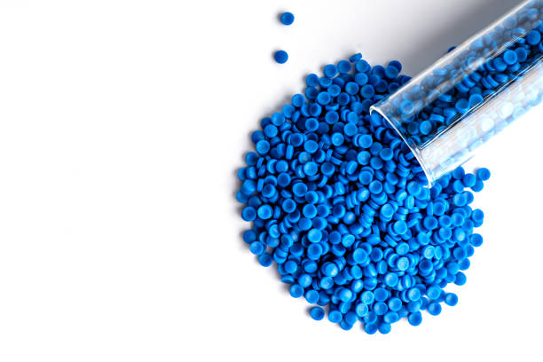 Small pieces of crushed plastic. Crushed bottle caps for recycling. Plastic waste that will be mixed with plastic vergin. Concept reducing plastic.