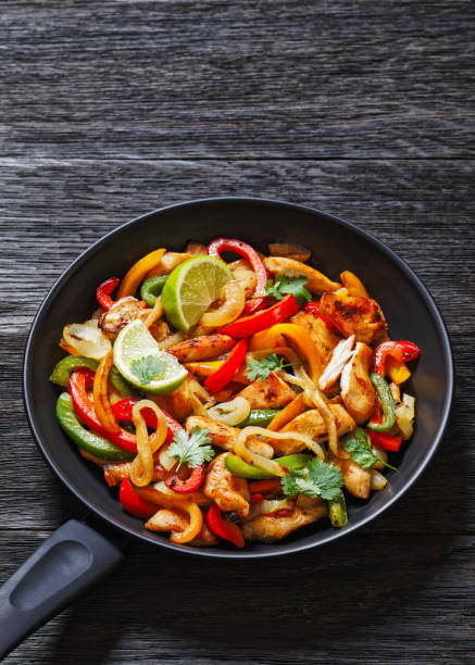 istock chicken fajitas with bell peppers, onion, spices 1484061413