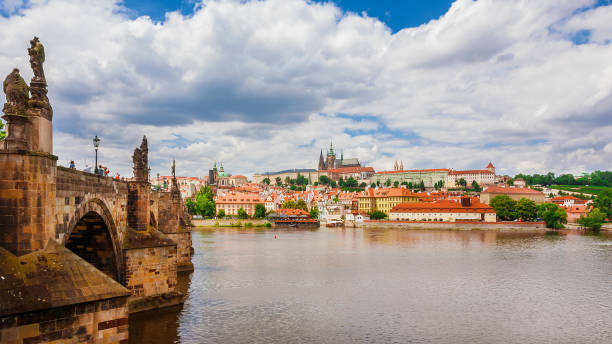 istock Prague historical center riverfront with Charles Bridge 1484063886