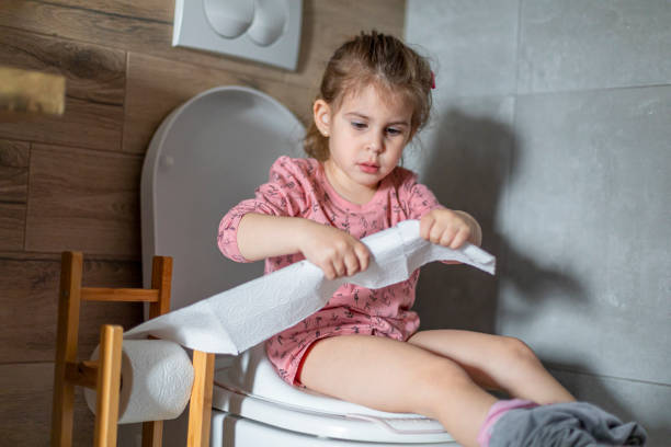 istock Good girl using big girl potty 1484075256