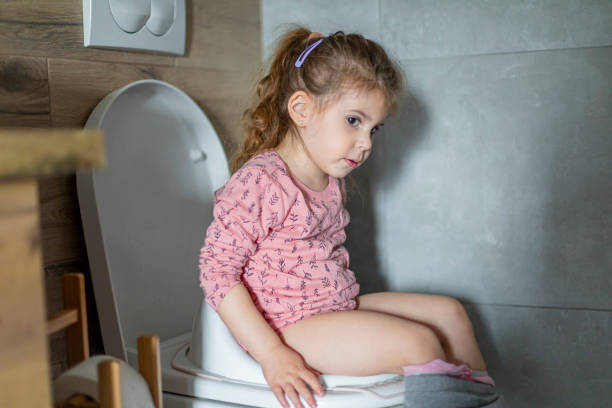 istock Good girl using big girl potty 1484075772