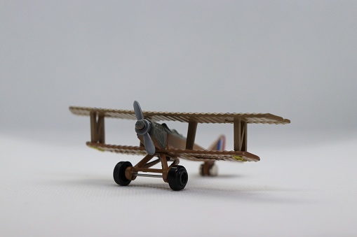 Toy plane on neutral background