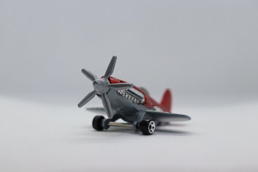 Toy plane on neutral background