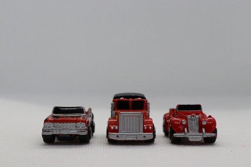 Red toy truck and cars