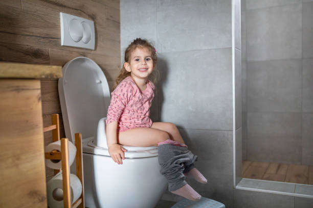 istock Good girl using big girl potty 1484078194