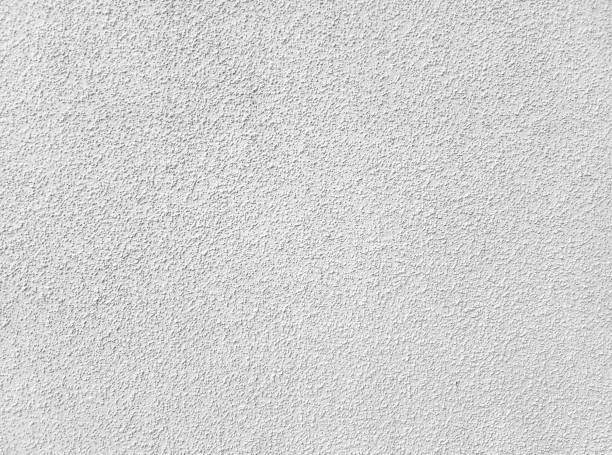 istock Texture of white plaster on a concrete wall handmade. Construction, interior design. 1484087741