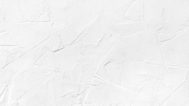 istock Texture of white plaster on a concrete wall handmade. Construction, interior design. 1484087772
