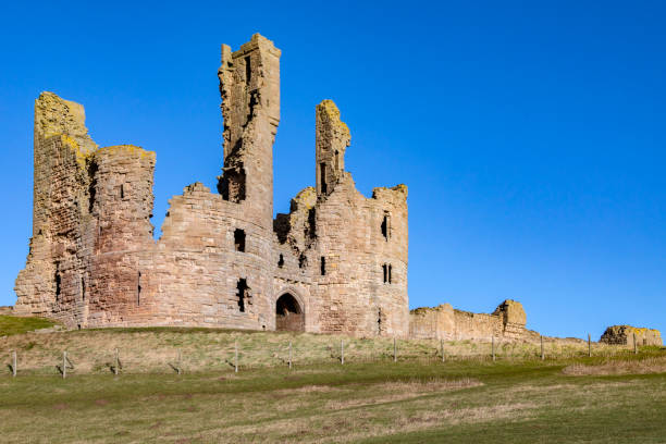 istock Dunstanburgh Castle - Northumberland - England 1484095930