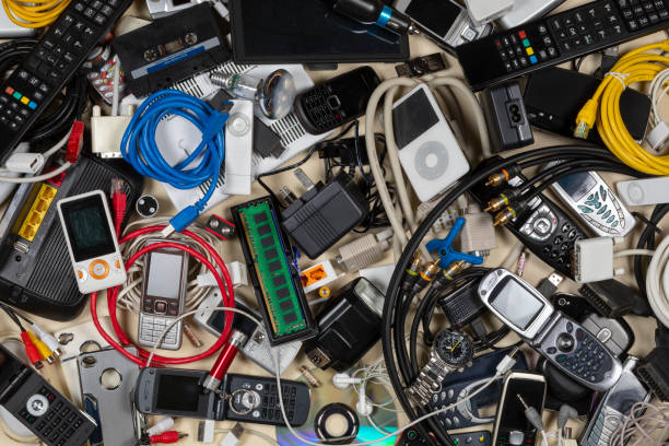 Obsolete and out of date technology Old out of date technology. Electrical items no longer of any use. Obsolete electrical waste for recycling. electronic scrap stock pictures, royalty-free photos & images
