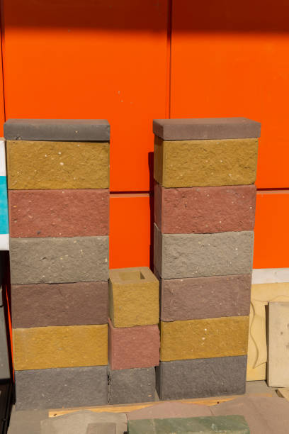 istock Samples of multicolored building blocks made of pressed cement-sand mixture. 1484099513