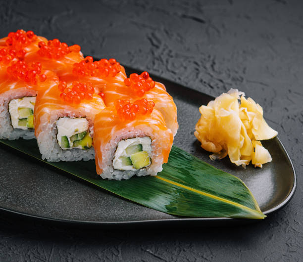 istock Philadelphia Sushi with avocado on black dish 1484101930
