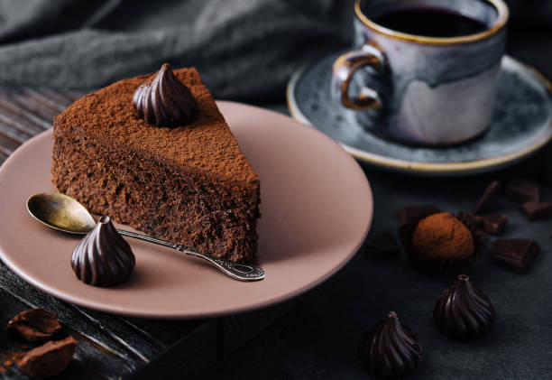 istock Piece of chocolate cake Truffle and tea cup 1484101935