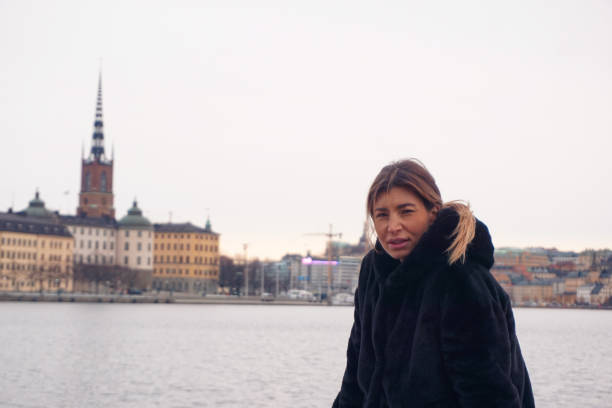 istock a person standing in front of cityscape 1484113542