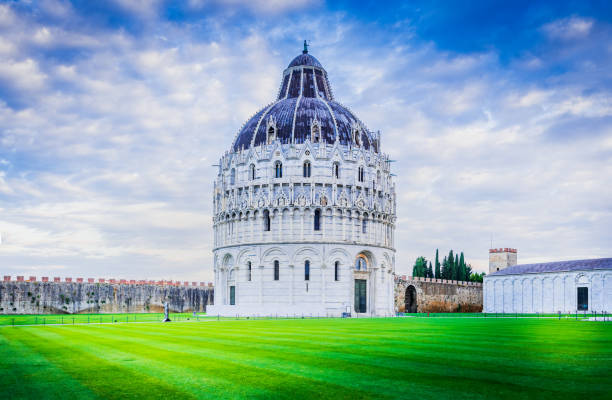 Pisa, Italy. Tuscany travel destination, Baptistery largest in Italia. Pisa Baptistery, largest in Italy and one of the most famous examples of Romanesque architecture in the world, Tuscany travel destination. pisa leaning tower of pisa tower famous place stock pictures, royalty-free photos & images