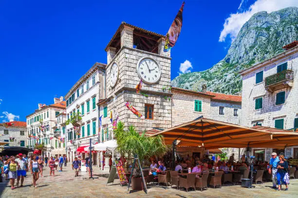 Kotor, Montenegro. Piazza of the Arms is a historic square in Cattaro, featuring stunning medieval Clock Towr and a charming atmosphere.