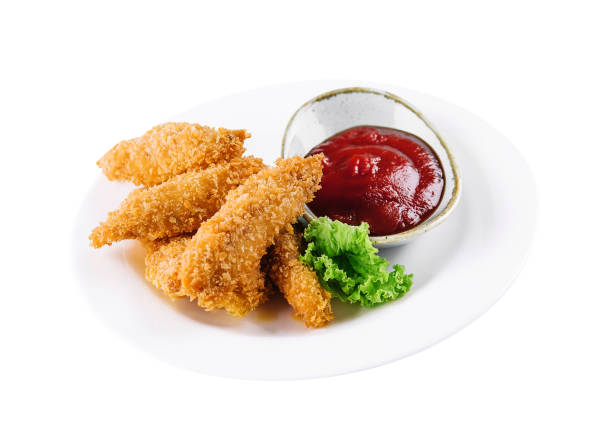 istock Homemade chicken nuggets with ketchup isolated 1484122148
