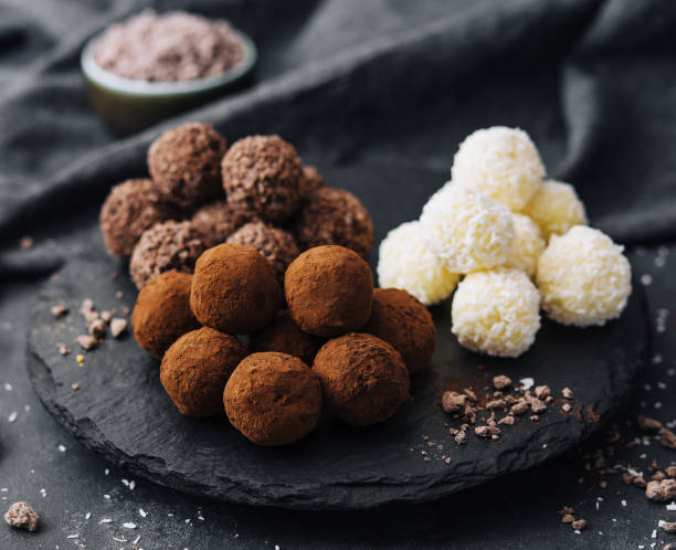 istock three types of chocolate balls on stone board 1484122177