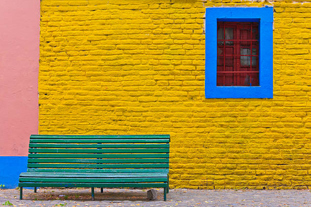 Green bench in Caminito street, La Boca stock photo