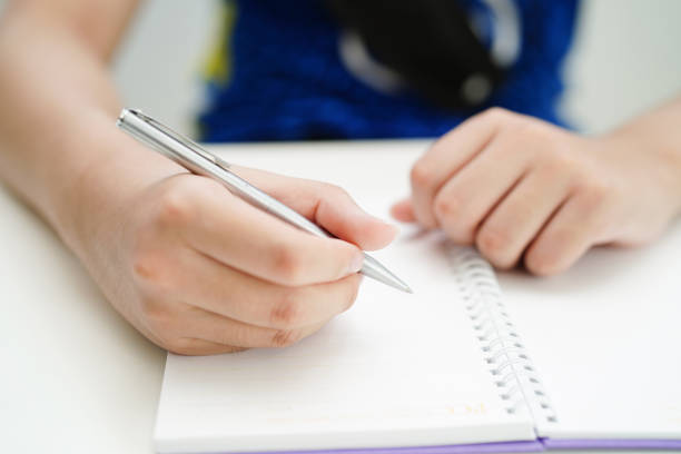 istock Asian teenage using mobile application in digital smartphone technology for learning. 1484126534