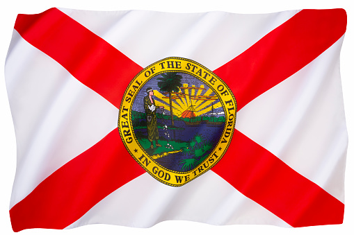 The state flag of Florida, USA.  Adopted on May 6th 1868 (modifications made in November 1900 and May 1985). Isolated on white for cut out.