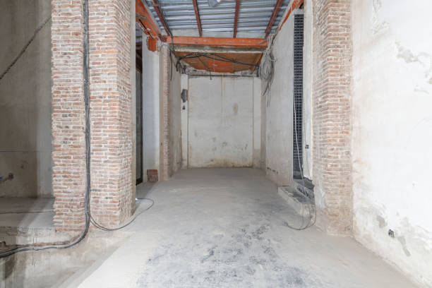 istock Local under construction with all the work half finished with metal roof in sight 1484127567