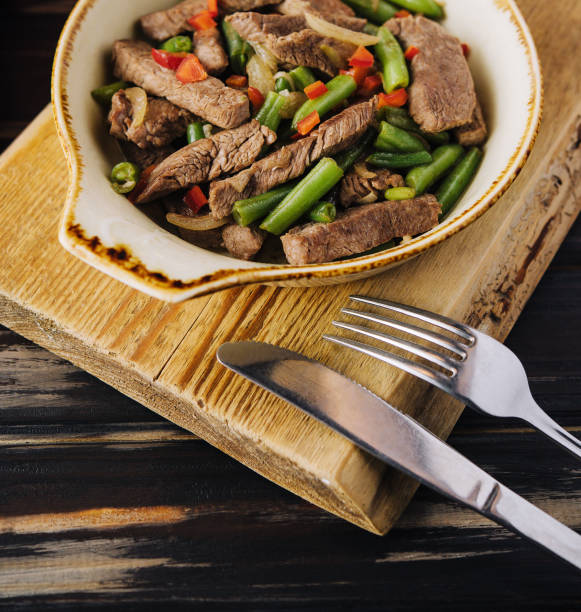 istock Veal with green beans and chilli pepper 1484129838