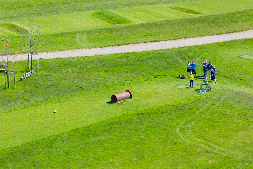 Inden - May 5: Aerial view of a small group of people playing soccer golf on a green lawn on May 5, 2016.