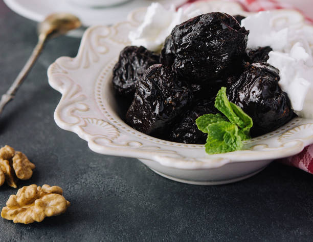 istock Cup of tea with prunes top view 1484131958