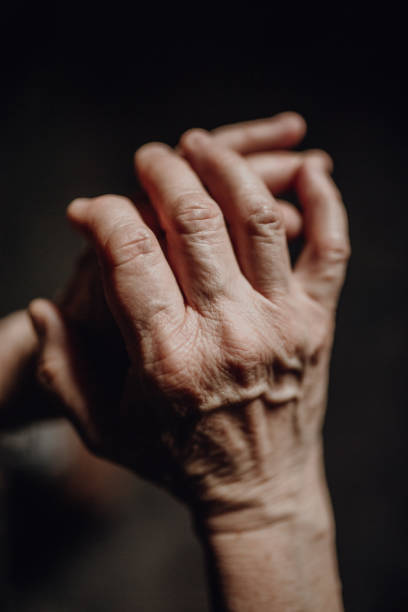 istock Close up of wrinkled hands, copy space. 1484134317