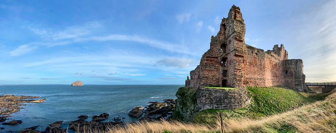 Tantallon Castle near North Berwick, in East Lothian, Scotland. This ruined mid-14th-century fortresss. It sits on a promontory opposite the Bass Rock, looking out onto the Firth of Forth. Built circa .1350