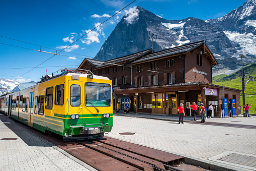 Kleine Scheidegg, Bernese Oberland, Switzerland - July 3, 2022:  The Wengeneralpbahn, a cogwheel train, is the longest through train in the Jungfrau Region. It links Lauterbrunnen and Grindelwald with the Kleine Scheidegg.