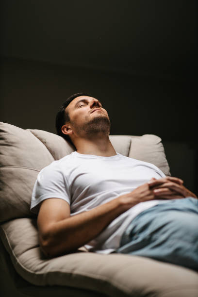 istock Man lying on psychiatric examination bed 1484137371